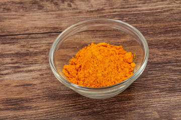 Tumeric powder in the bowl