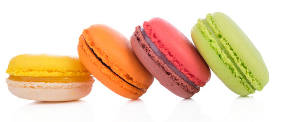 Sweet and colourful french macaroons on white background