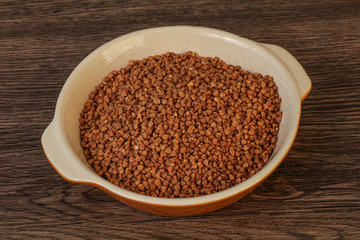 Raw buсkwheat cereal in the bowl
