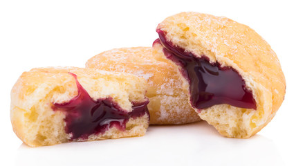 Tasty donuts with jam on white background.