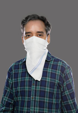 Indian Man With Handkerchief Mask For Covid-19 / Coronavirus Prevention