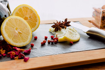 close-up of a sliced ​​lemon on a black board