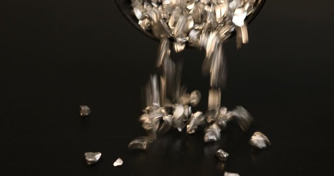 Sprinkle silver metal expensive material on black background