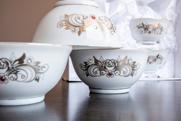 Cups for drinking tea, background with tea, cups in a box.