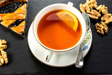 Drinking tea with nut pie