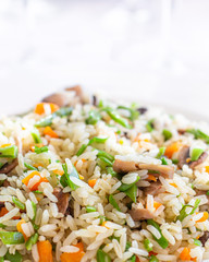 Cooked White Rice With Vegetables On The White Plate