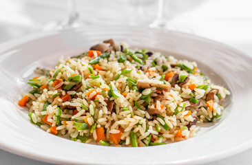 Cooked White Rice With Vegetables On The White Plate