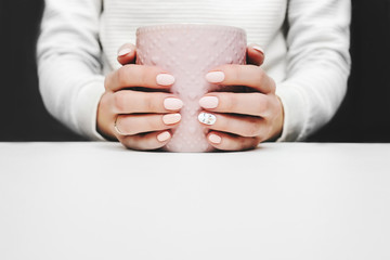 Woman in white sweater headless