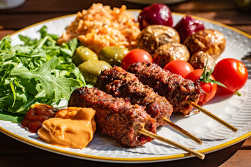 A delicious selection of summer food and grilled kebabs