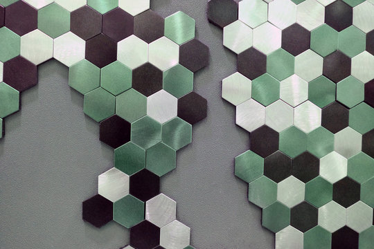 Hexagonal Tile Texture In The Form Of Magnets On The Wall