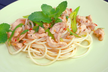 Close up spaghetti on the soft green color plate