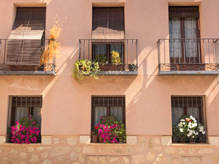 Fototapeta na wymiar Beautiful balconies with flowers