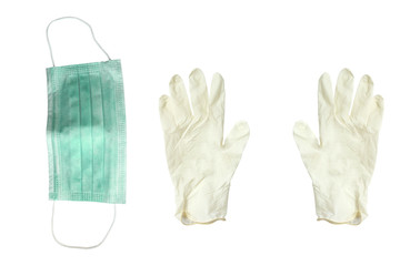Respiratory mask for face and rubber gloves on a white background