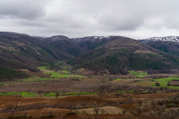 Fototapeta na wymiar Mountain landscape, fields in the valley