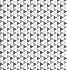 Geometric pattern of gray triangles. Black and white background. Vector seamless pattern.