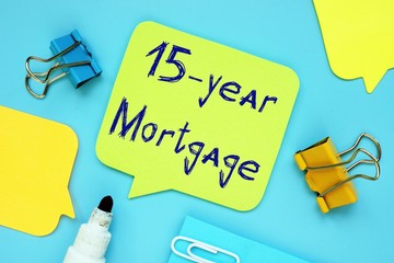 Business concept about 15-year Mortgage with sign on the piece of paper.