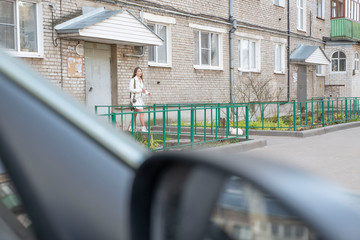girl with a phone on the street