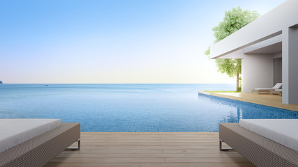 Naklejka na ściany i meble Lounge chair on terrace near swimming pool and garden in modern beach house or luxury villa. Building exterior 3d rendering with sea view.