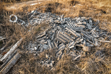 pile of broken asbestos slate