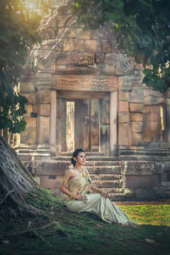 Woman wearing Thai national culture dress at the stone castle.