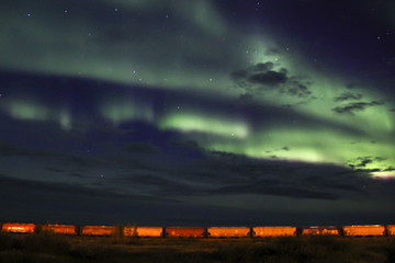 Northern lights dancing above the town of Churchill