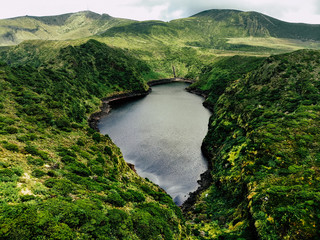 The Lost Lake. A mysterious lake hidden between the green hills of Flores island in Azores.