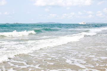 Spectacular scenery of ocean waves and speed boat