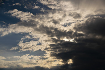 gray Cumulus clouds in a blue sky