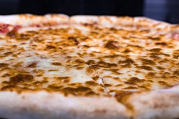 Closeup shot of a yummy Cheese Pizza