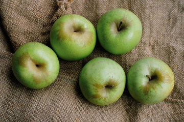 Golden apples close-up from above
