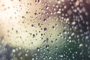 Water drops on glass of car sunroof with copy space. 