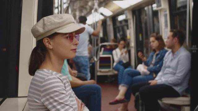 Young tourist riding in the subway in Paris, France