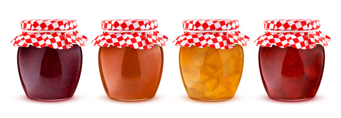 Glass jar of fruit and berry jam isolated on white background