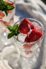 Fresh strawberries with yoghurt and whipped cream. Breakfast time. Healthy food. Delicious dessert sugar free. Vegetarian dish. Spring time 