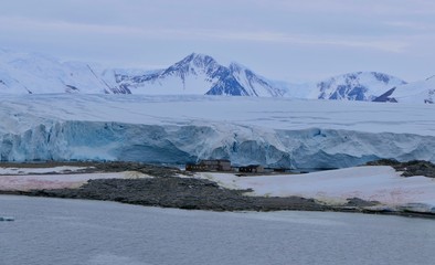 East base before glacier at Stonington Island and mountains in the background, Antarctica