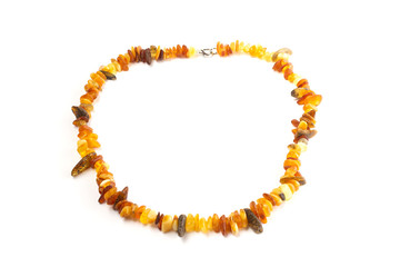 natural amber beads on a white background isolate