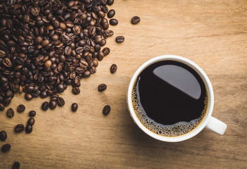 Close-up of black coffee in white cup