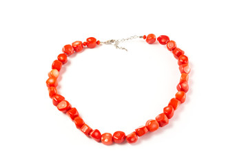 natural coral beads on a white background isolate