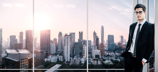 Business man on office skyline city