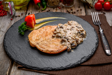 Creamy Garlic Mushroom Chicken. On a wooden table