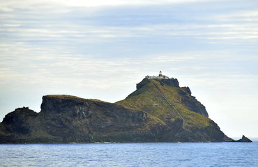 Sunny volcanic island in the atlantic ocean.