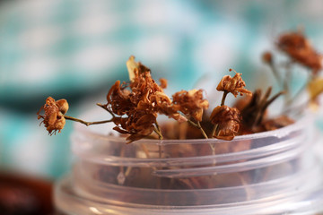 Dry medicinal grass in a jar, macro