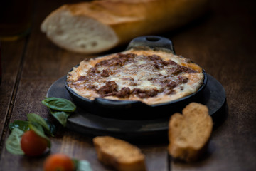 Baked Lasagne  with Mozzarella Cheese Basil and Cherry Tomatoes