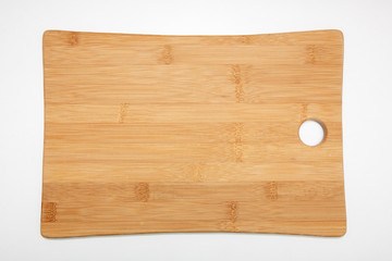 Bamboo wood cutting board on white background