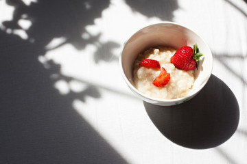 oatmeal porridge with strawberries for Breakfast