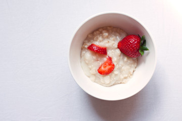 oatmeal porridge with strawberries for Breakfast