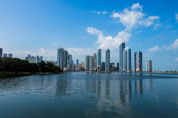 Fototapeta na wymiar Panorama of the center of the Emirate of Sharjah, United Arab Emirates . Walking area in the UAE city. Real estate in United Arab Emirates .