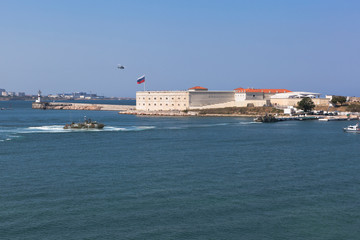 Fototapeta premium Raptor landing boats moor to the pier near the Konstantinovsky barracks at the celebration of Navy Day in Sevastopol Bay, Crimea