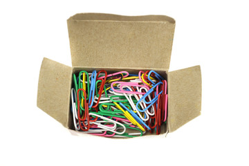 Box of paper clips stationery color isolated on white