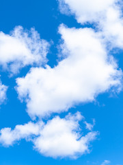 Obraz premium fluffy white clouds in blue sky on March day